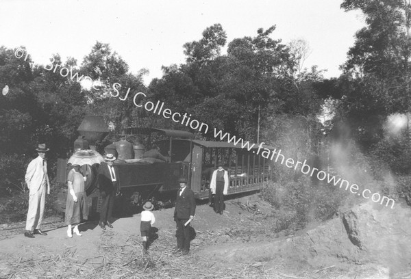 TRAINS ON WAY TO SUGAR FIELDS WITH PEOPLE